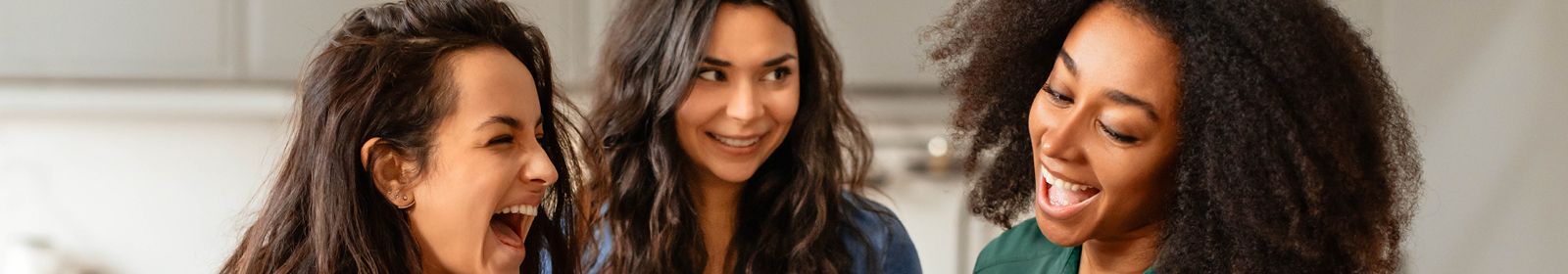 women laughing.
